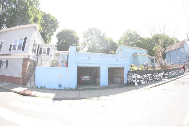 375 Baldwin St, Waterbury, CT 06706 - view of front facade featuring a garage