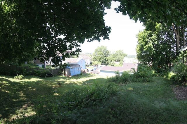 375 Baldwin St, Waterbury, CT 06706 - view of yard with a storage unit