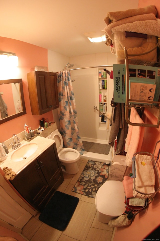 375 Baldwin St, Waterbury, CT 06706 - bathroom featuring a shower with shower curtain and vanity