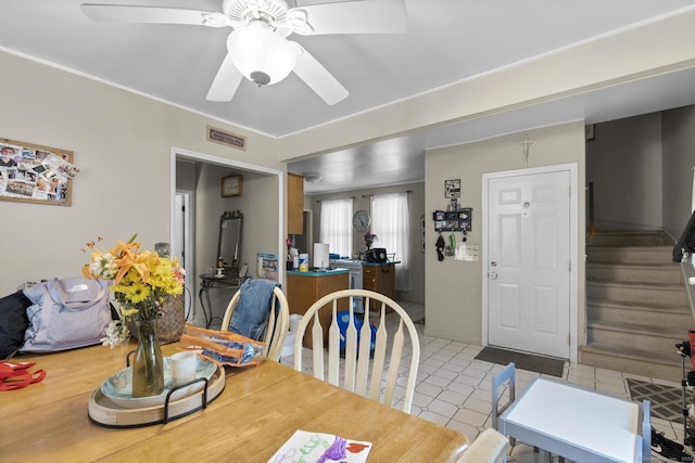 78 Church St, Hamden, CT 06514 - tiled dining area with a ceiling fan and stairs