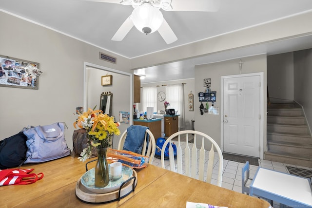 78 Church St, Hamden, CT 06514 - dining area featuring a ceiling fan and stairway