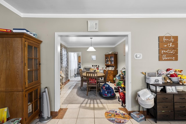 78 Church St, Hamden, CT 06514 - dining space featuring ornamental molding and light tile patterned flooring