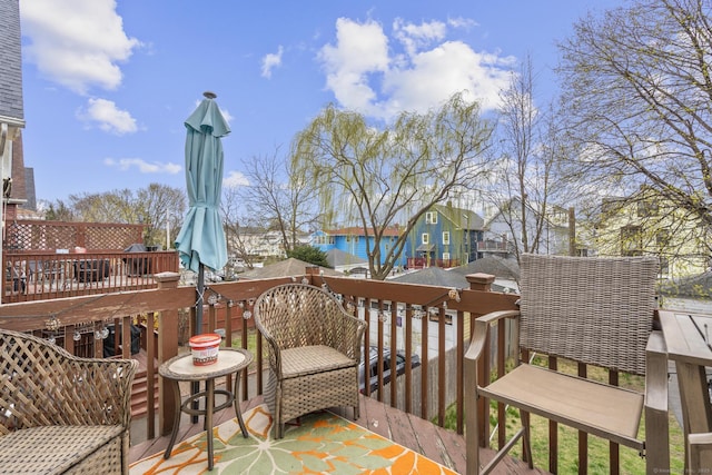 78 Church St, Hamden, CT 06514 - wooden deck featuring a residential view