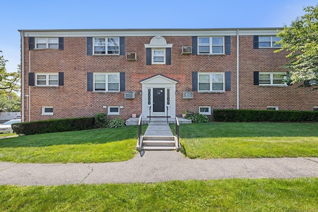 90 Strawberry Hill Ave Unit 3, Stamford, CT 06902 - view of front facade featuring brick siding and a front lawn