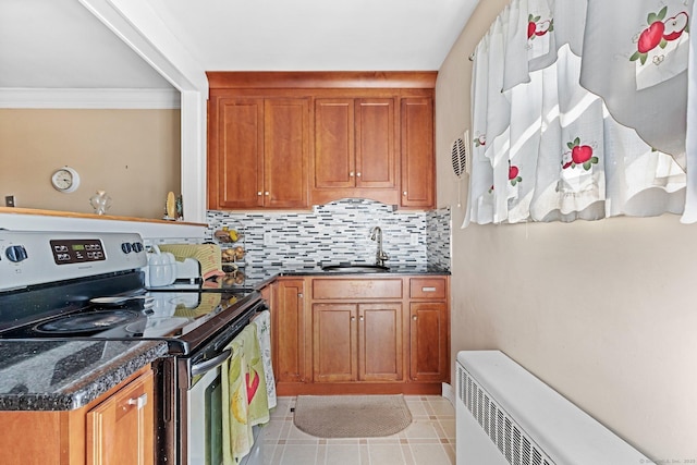 90 Strawberry Hill Ave Unit 3, Stamford, CT 06902 - kitchen with stainless steel electric range, decorative backsplash, dark countertops, brown cabinetry, and crown molding