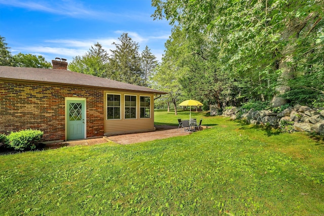 449 Mohegan Avenue Parkway, Waterford, CT 06375 - view of grassy yard with a patio area