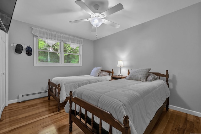 449 Mohegan Avenue Parkway, Waterford, CT 06375 - bedroom with a baseboard heating unit, hardwood / wood-style floors, and ceiling fan