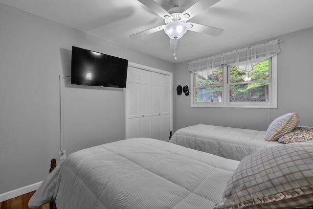 449 Mohegan Avenue Parkway, Waterford, CT 06375 - bedroom featuring a closet, wood finished floors, and a ceiling fan
