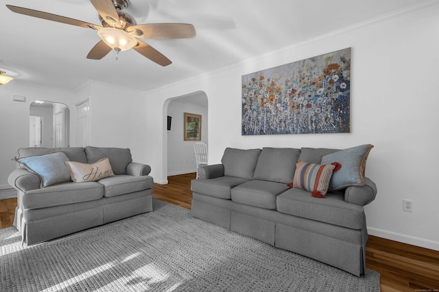 449 Mohegan Avenue Parkway, Waterford, CT 06375 - living area with arched walkways, wood finished floors, ceiling fan, and crown molding