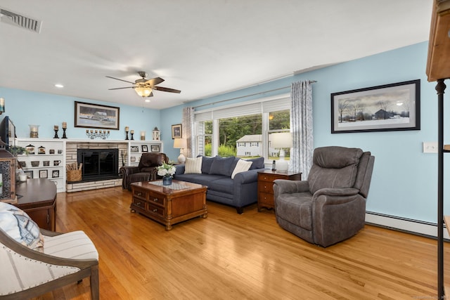 17 Valley Stream Dr, Danbury, CT 06811 - living area featuring light wood-style floors, ceiling fan, a baseboard radiator, recessed lighting, and a fireplace