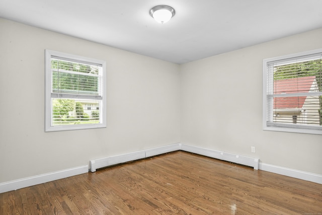 198 Macon Dr, Bridgeport, CT 06606 - spare room featuring plenty of natural light and wood finished floors