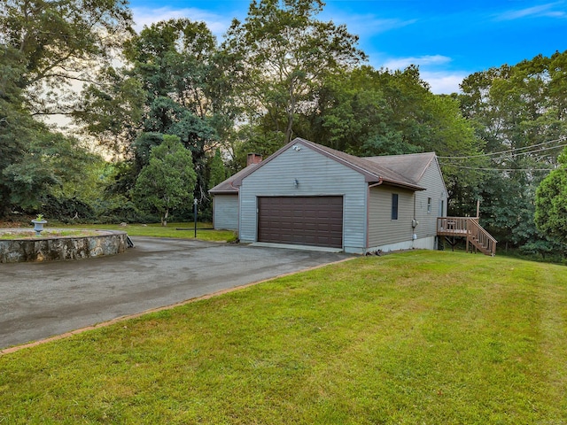 41 Fog Plain Rd, Waterford, CT 06385 - garage with driveway and view of wooded area