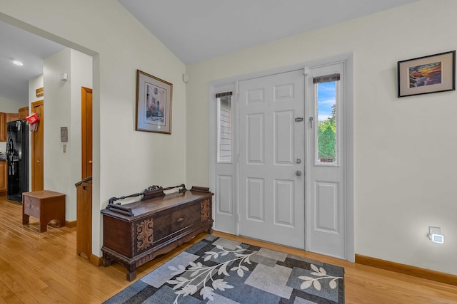 41 Fog Plain Rd, Waterford, CT 06385 - entrance foyer with light wood-style flooring and lofted ceiling