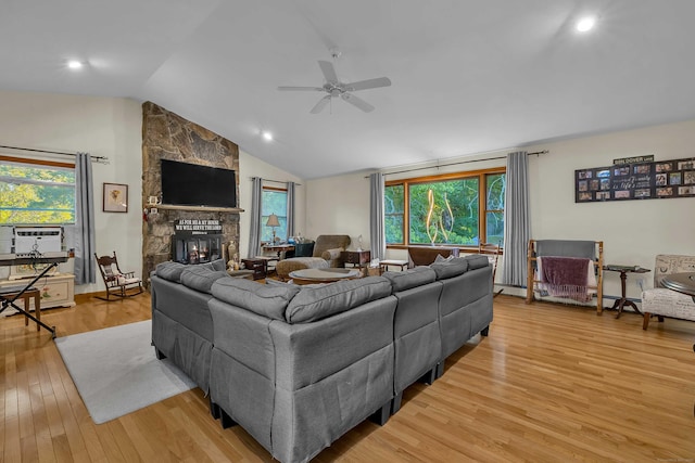 41 Fog Plain Rd, Waterford, CT 06385 - living room featuring ceiling fan, vaulted ceiling, a fireplace, light wood-type flooring, and cooling unit