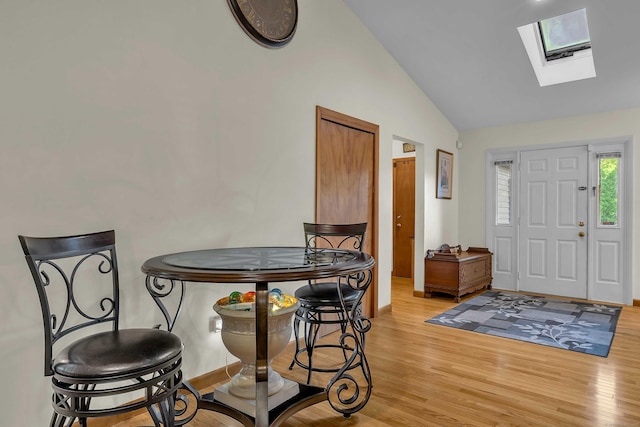 41 Fog Plain Rd, Waterford, CT 06385 - dining space with a skylight, lofted ceiling, and light wood-type flooring