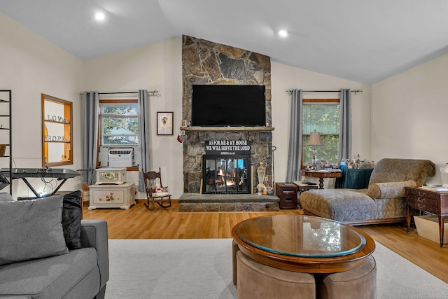 41 Fog Plain Rd, Waterford, CT 06385 - living area featuring vaulted ceiling, a fireplace, and wood finished floors
