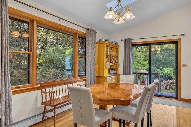 41 Fog Plain Rd, Waterford, CT 06385 - dining area featuring a chandelier, vaulted ceiling, and light wood-style flooring