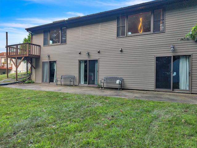 41 Fog Plain Rd, Waterford, CT 06385 - rear view of house with a lawn, a patio, and a deck