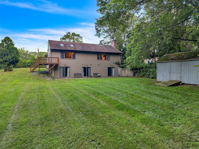 41 Fog Plain Rd, Waterford, CT 06385 - back of property featuring stairs, a chimney, a deck, a shed, and a yard