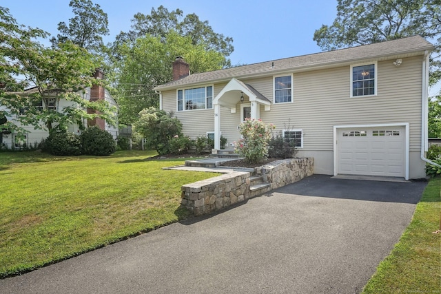 76 Valley View Rd, Norwalk, CT 06851 - split foyer home with a garage, a chimney, driveway, and a front lawn