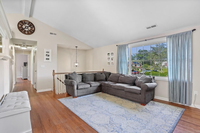 76 Valley View Rd, Norwalk, CT 06851 - living area featuring wood finished floors, beam ceiling, and high vaulted ceiling
