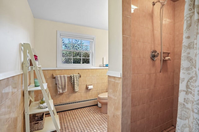 76 Valley View Rd, Norwalk, CT 06851 - full bath featuring baseboard heating, tile walls, a tile shower, a wainscoted wall, and tile patterned flooring