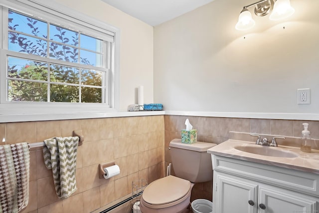 76 Valley View Rd, Norwalk, CT 06851 - half bathroom with vanity, wainscoting, and tile walls