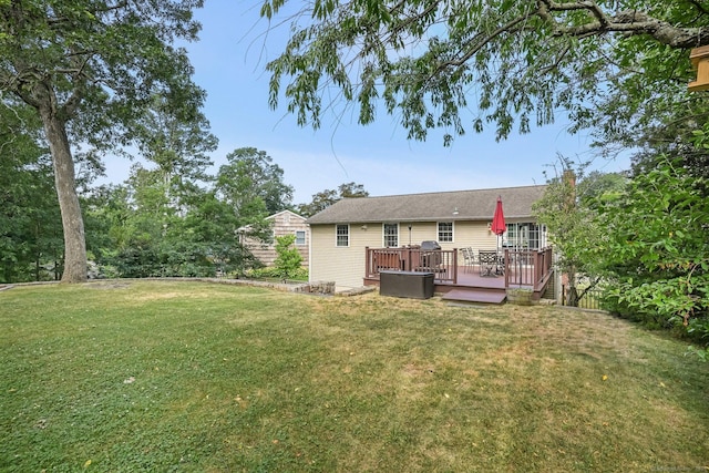 76 Valley View Rd, Norwalk, CT 06851 - rear view of property featuring a lawn and a deck