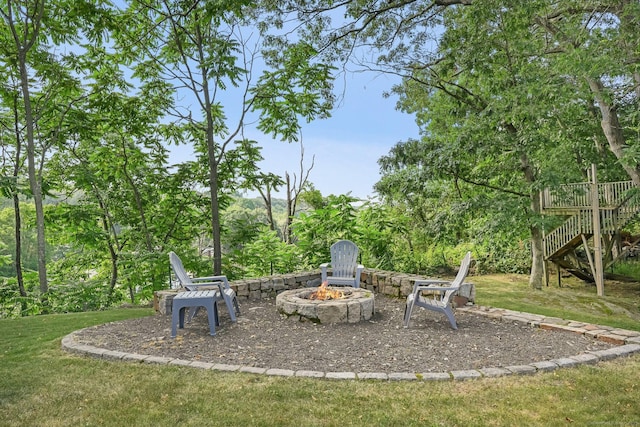 76 Valley View Rd, Norwalk, CT 06851 - view of green lawn featuring an outdoor fire pit and stairway