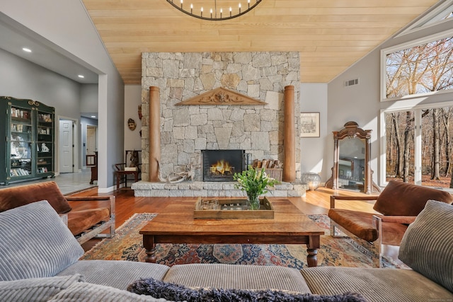 80 Norton Rd, Easton, CT 06612 - living room featuring wooden ceiling, a fireplace, vaulted ceiling, wood finished floors, and a chandelier
