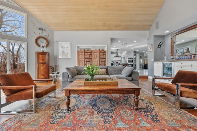 80 Norton Rd, Easton, CT 06612 - living area featuring wood ceiling, wine cooler, wood finished floors, a dry bar, and high vaulted ceiling