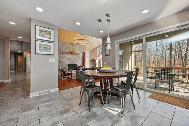 80 Norton Rd, Easton, CT 06612 - dining room with a stone fireplace, recessed lighting, tile patterned flooring, and a chandelier
