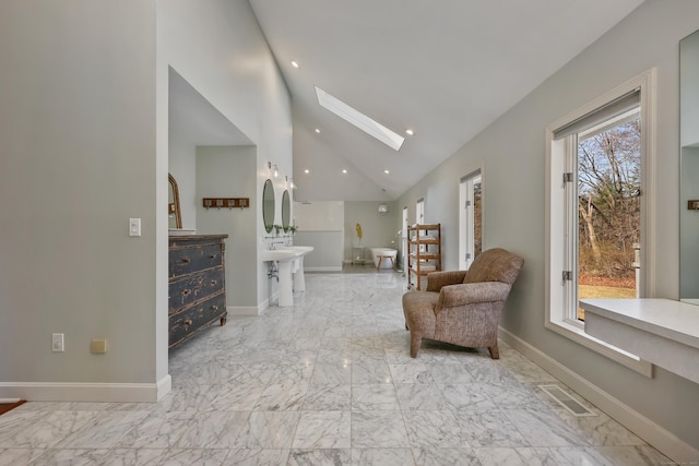 80 Norton Rd, Easton, CT 06612 - living area featuring vaulted ceiling, a skylight, recessed lighting, and marble finish flooring