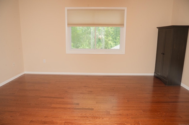 234 Greens Farm Rd Unit 234, Branford, CT 06405 - spare room featuring wood finished floors and baseboards