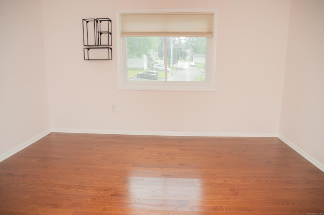 234 Greens Farm Rd Unit 234, Branford, CT 06405 - empty room featuring wood finished floors and baseboards