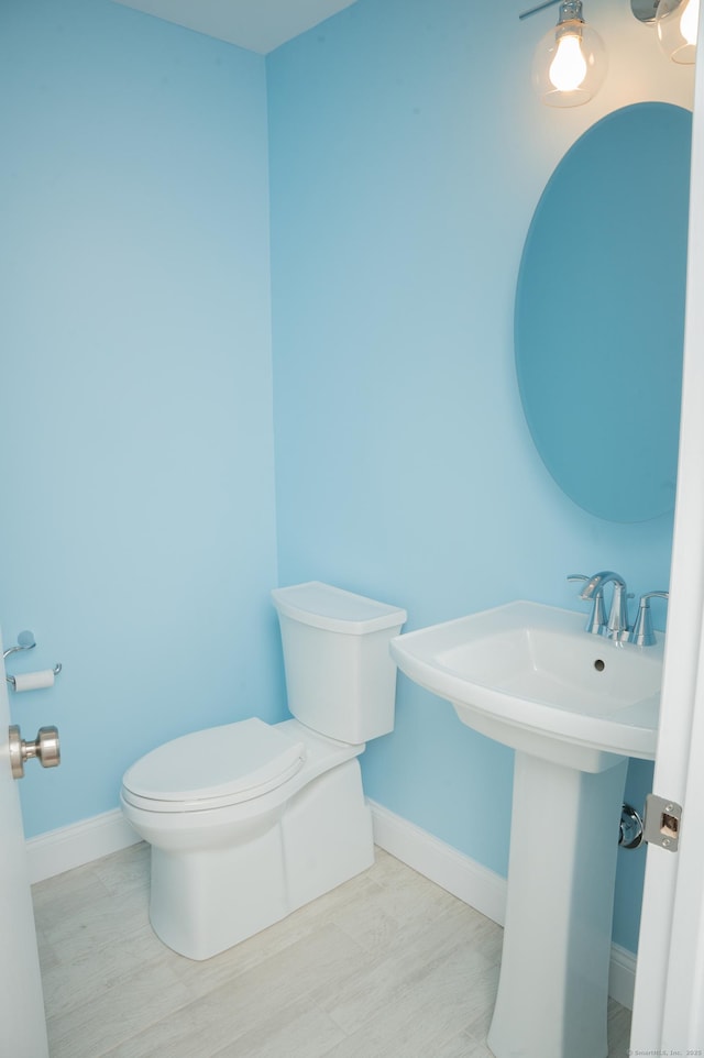 234 Greens Farm Rd Unit 234, Branford, CT 06405 - bathroom with toilet and wood finished floors