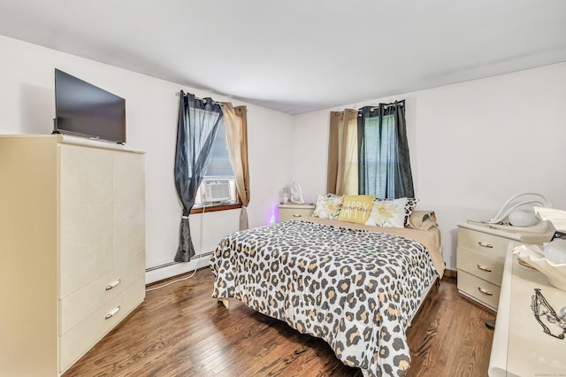 474 Franklin Ave, Stratford, CT 06614 - bedroom featuring baseboard heating, cooling unit, and wood finished floors