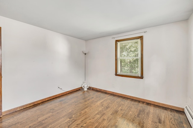 474 Franklin Ave, Stratford, CT 06614 - unfurnished room with wood finished floors and a baseboard radiator