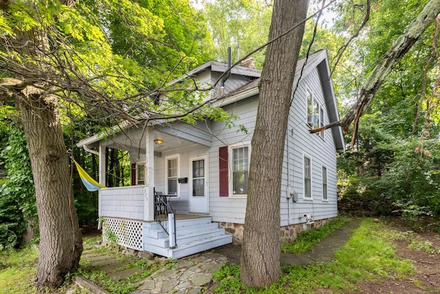 370 Waterville St, Waterbury, CT 06710 - view of front of home featuring a porch and a chimney