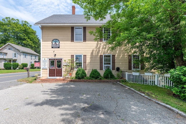 696 Kent Rd, New Milford, CT 06755 - view of front of home featuring a chimney and roof with shingles