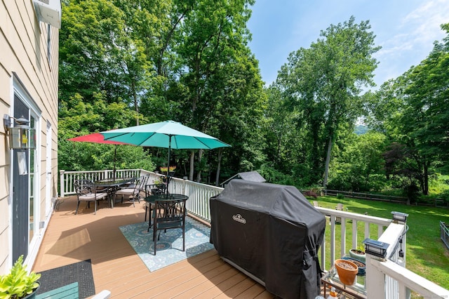 696 Kent Rd, New Milford, CT 06755 - wooden deck featuring outdoor dining space, a lawn, a grill, and view of scattered trees