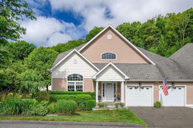 10 Harmony Trl Unit 10, New Milford, CT 06776 - traditional-style home featuring an attached garage, asphalt driveway, and roof with shingles