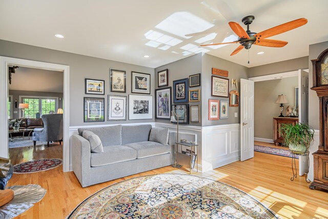 10 Harmony Trl Unit 10, New Milford, CT 06776 - living room featuring a ceiling fan, a wainscoted wall, wood finished floors, and recessed lighting
