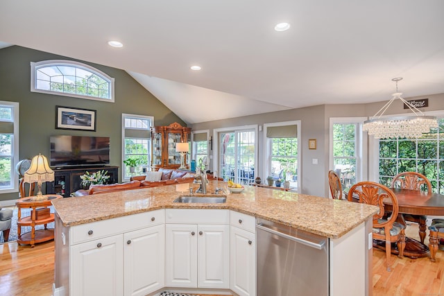 10 Harmony Trl Unit 10, New Milford, CT 06776 - kitchen featuring dishwasher, open floor plan, a chandelier, light wood-style floors, and white cabinetry