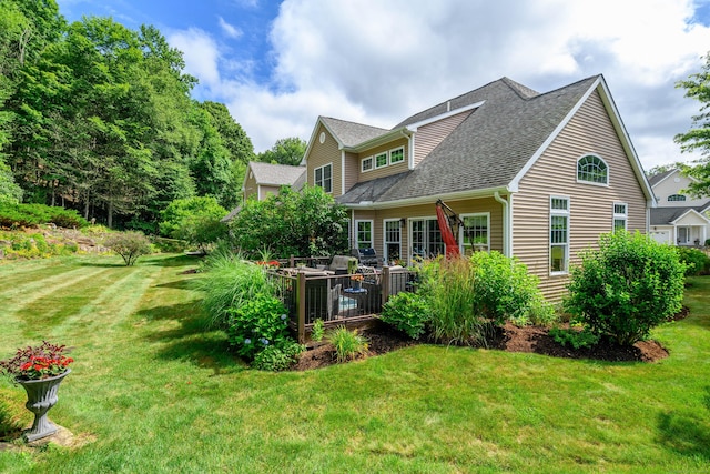 10 Harmony Trl Unit 10, New Milford, CT 06776 - back of house with a yard, a shingled roof, and a deck