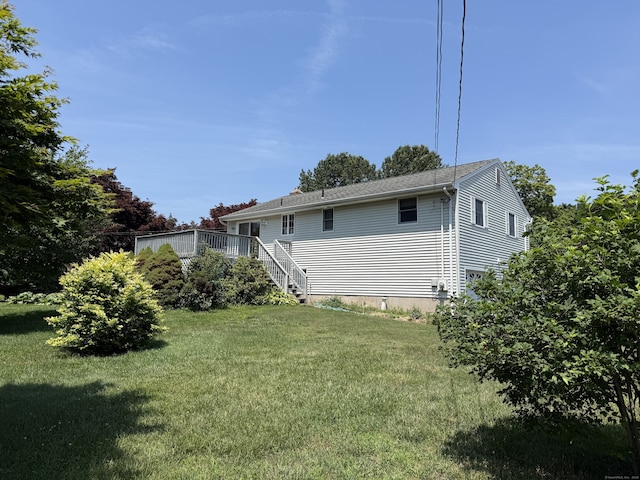 109 Ashley Rd, Bristol, CT 06010 - rear view of property with a yard and stairs
