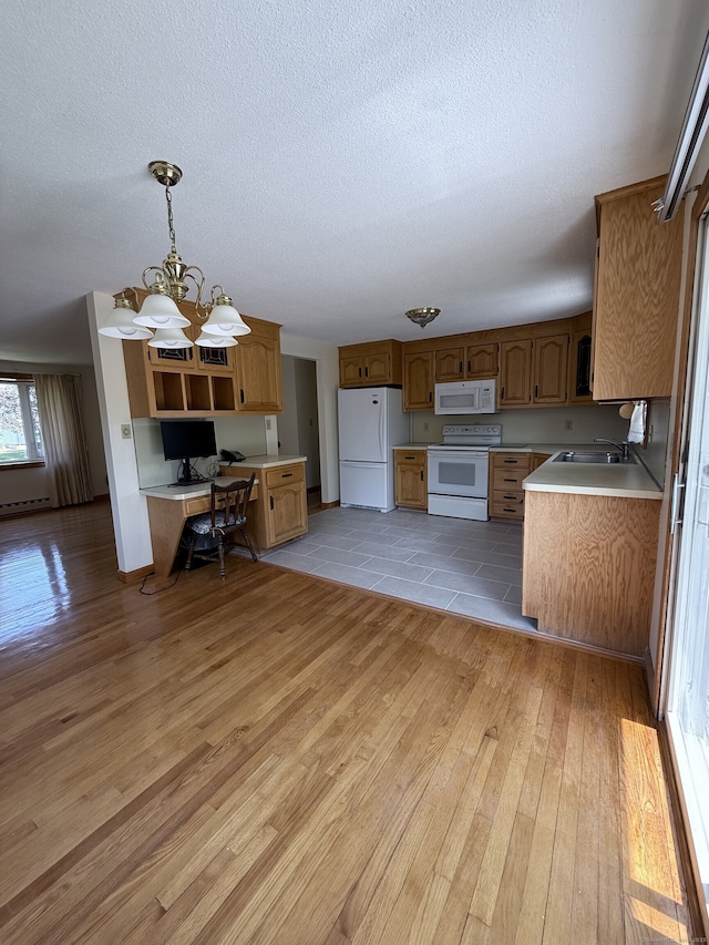 109 Ashley Rd, Bristol, CT 06010 - kitchen featuring white appliances, light wood finished floors, light countertops, a textured ceiling, and an office area