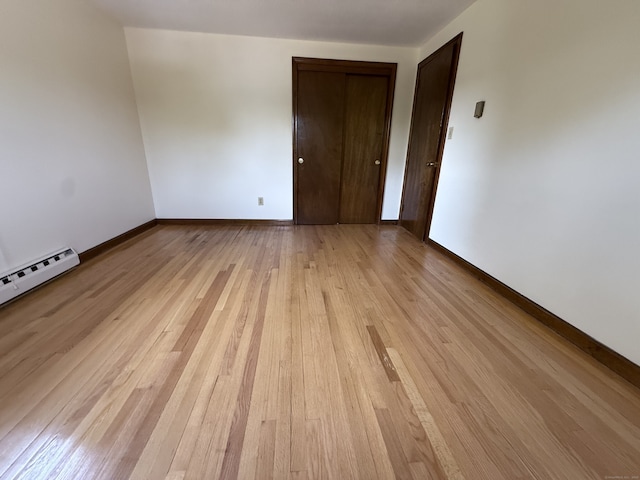 109 Ashley Rd, Bristol, CT 06010 - spare room with light wood finished floors and baseboard heating