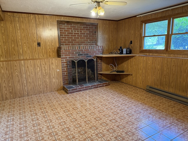109 Ashley Rd, Bristol, CT 06010 - unfurnished living room with wood walls, a textured ceiling, a ceiling fan, a fireplace, and crown molding