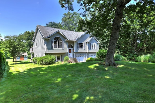 11 Parlor Rock Rd, Trumbull, CT 06611 - bi-level home featuring an attached garage and a front yard